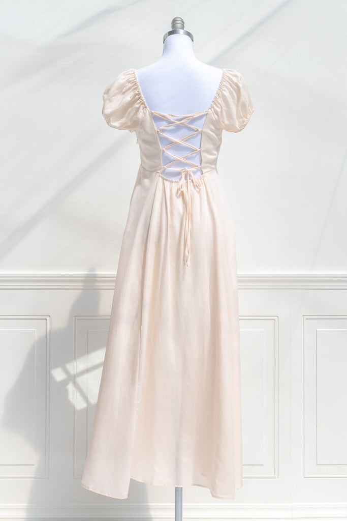 feminine cottagecore dress in cream color. back view. 
