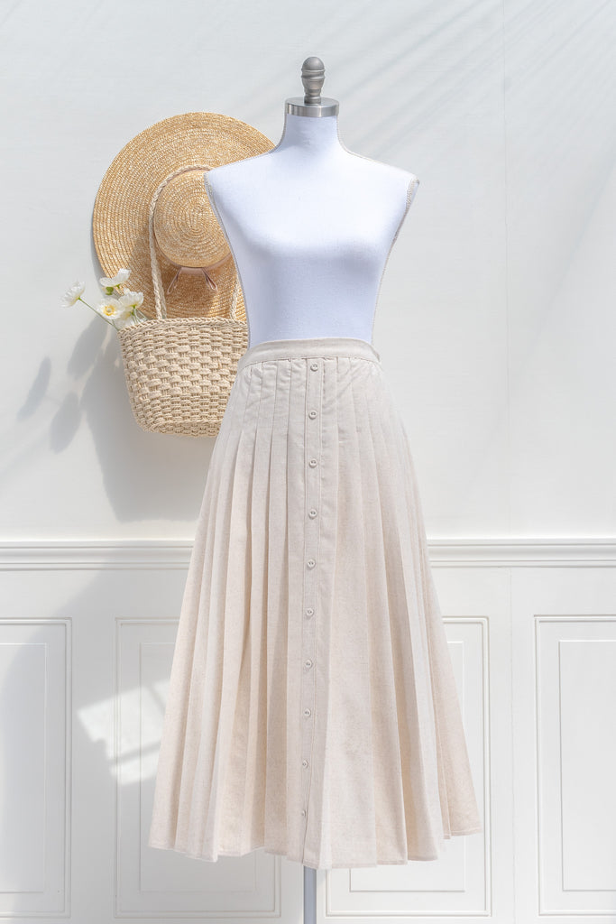 pleated elegant linen skirt french style. cottagecore skirt midi length - front view. 