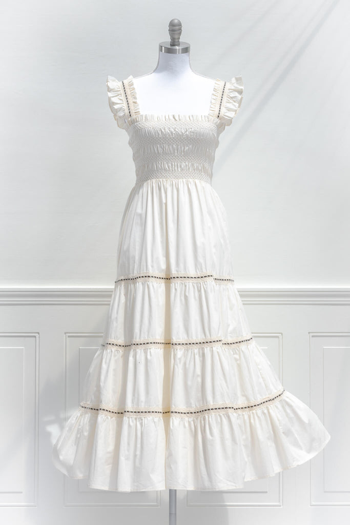 cottagecore dresses for summer - an off white cotton dress in a feminine style. front view. amantine.