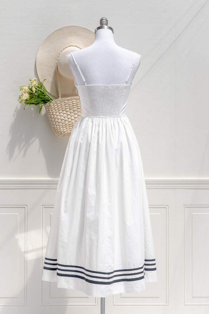 the white lotus season 3 piper ratliff's dress - a white dress with blue stripes on bust and hem. front view. 