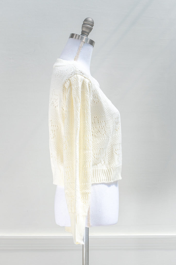 French Style Fashion - A cream knitted cardigan in feminine and romantic style side view - amantine 