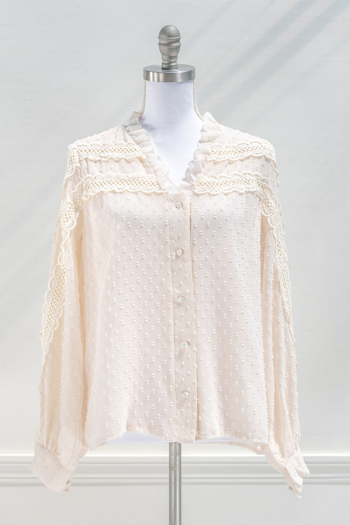 Vintage style clothes - a cream colored lace blouse with ruffles at the neckline and lace - from amantine boutique