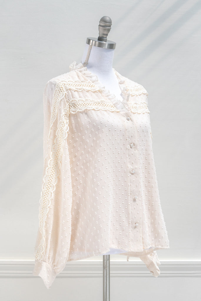 Vintage style clothes - a cream colored lace blouse with ruffles at the neckline and lace - from amantine boutique