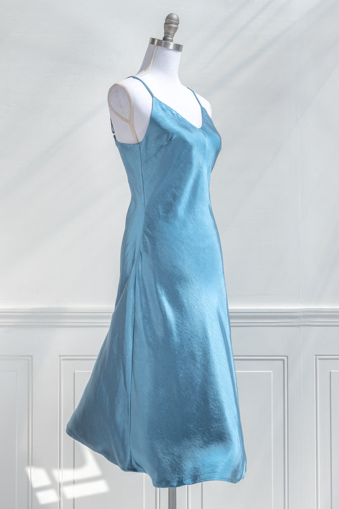 french slip dress - light blue slip dress with adjustable shoulder straps, v neckline, and satin quality fabric, midi length - amantine - french style - quarter view