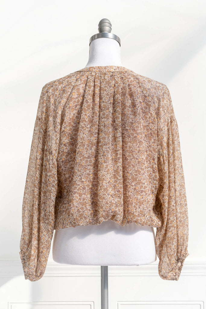feminine clothing - amantine - a modest, long-sleeve, button up, caramel blouse - amantine - back view