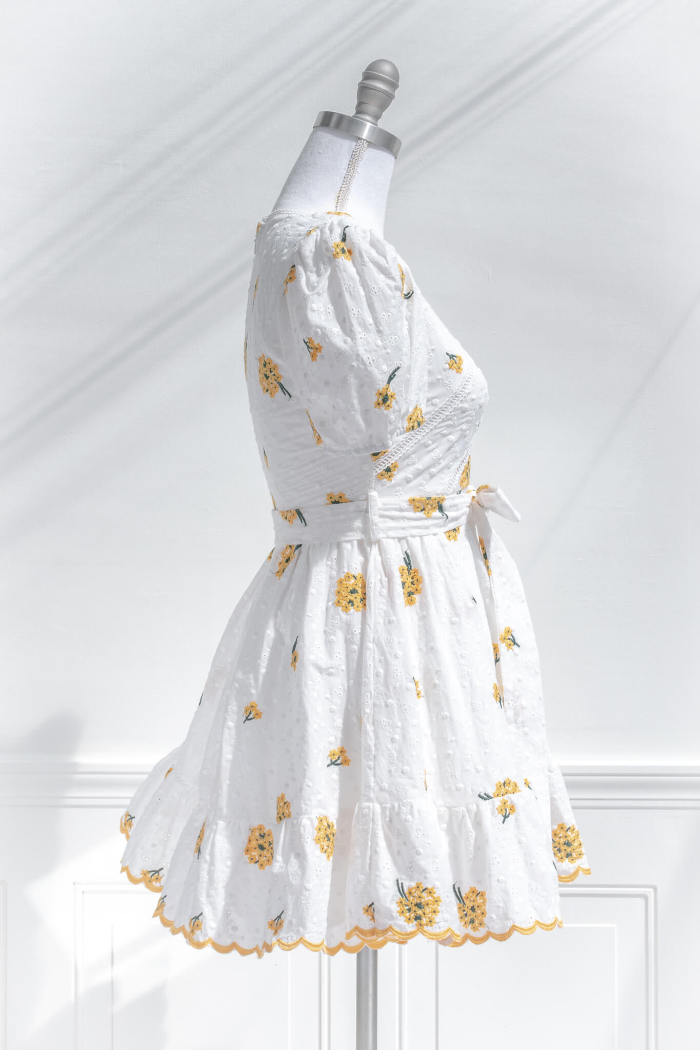 White dress with yellow flowers sales