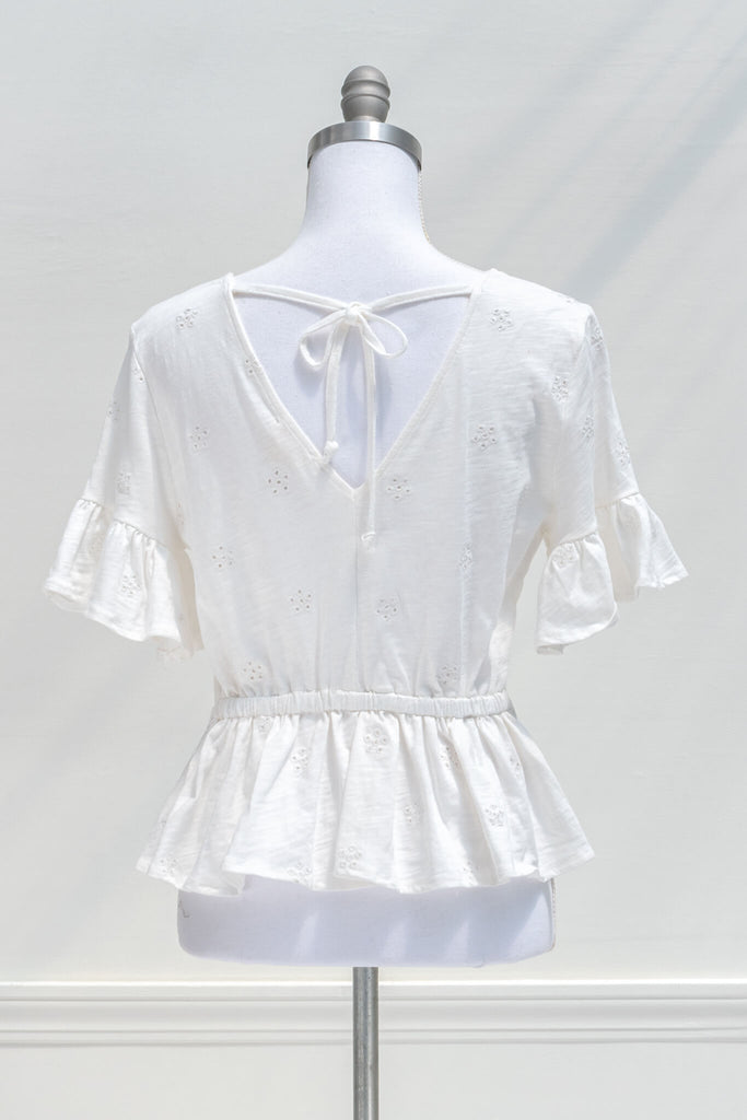 feminine french style separates - a white, v neck, lace detail, peplum blouse, amantine 