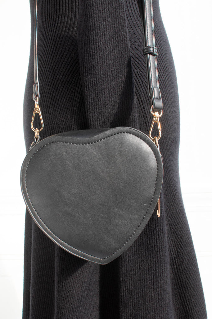 feminine accessories french girl style. a heart shaped women's purse for valentines 